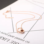 CYNTHIA – Roman Numeral Charm Necklace