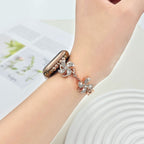 Apple Watch bracelet in metal alloy, rotating lotus flower, adjustable clip-on links, for women, Lossia model